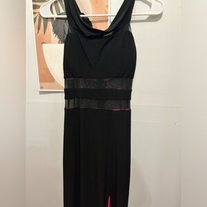Full length black evening gown, with slit abs lined pink